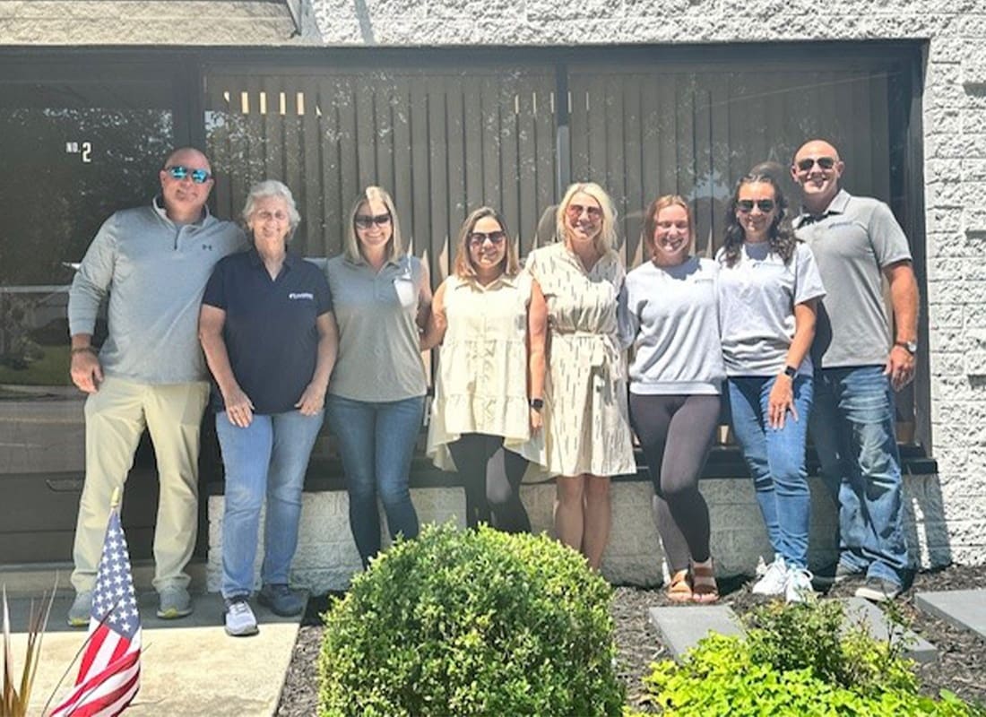 Fairborn, OH - Local Insurance Team Standing Outside of Their Office as the Sun Shines